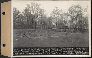 Contract No. 80, High Level Distribution Reservoir, Weston, looking northeast showing grading operations on Access Road between dam 3 and dam 4, contractor's equipment shop and yard, high level distribution reservoir, Weston, Mass., May 29, 1940