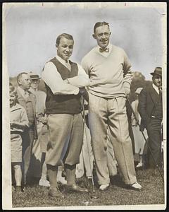 Gene Sarazen, United States and British open king, and his opponent Ouimet, talk the course over before starting their match.