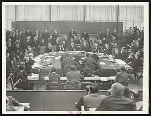 As Laval Scored Germany at Geneva. Here is the historic scene, with the league of nations council in special session, when Foreign Minister Laval read France's condemnation of German rearmament. (Left to right, around table) representatives of Chile, Denmark, Argentina, Mexico, Spain-an empty chair for Germany- Baron Aloisi, Italy; Laval; Tewfik Rushdi Aras, Turkey; the league's sec-general, Avenol; Sir John Simon, England; Litvinov, Russia; Dr. Benes, Czecho-Slovakia; Col. Beck, Poland; Austria and Portugal.