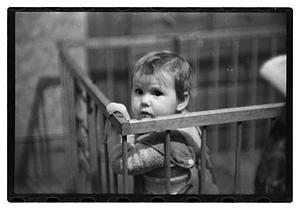 Toddler in crib
