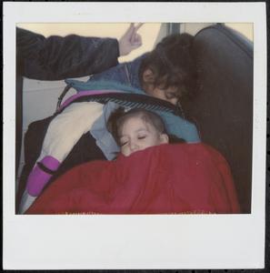 Girls sleeping on the bus