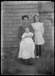 Woman w/ baby & young girl