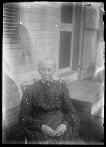 Woman seated outside
