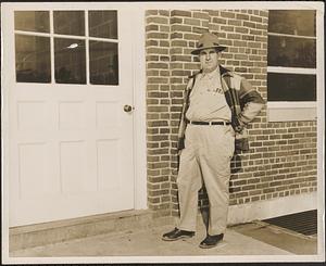 Lawrence Peck, Highway Superintendent, standing outside the old highway garage