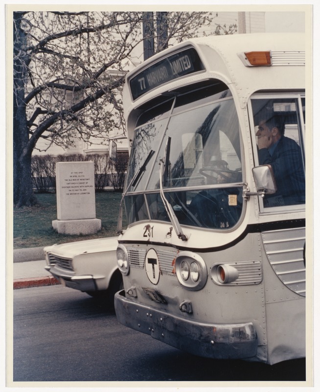 MBTA bus in front of First Parish Church, Massachusetts Avenue