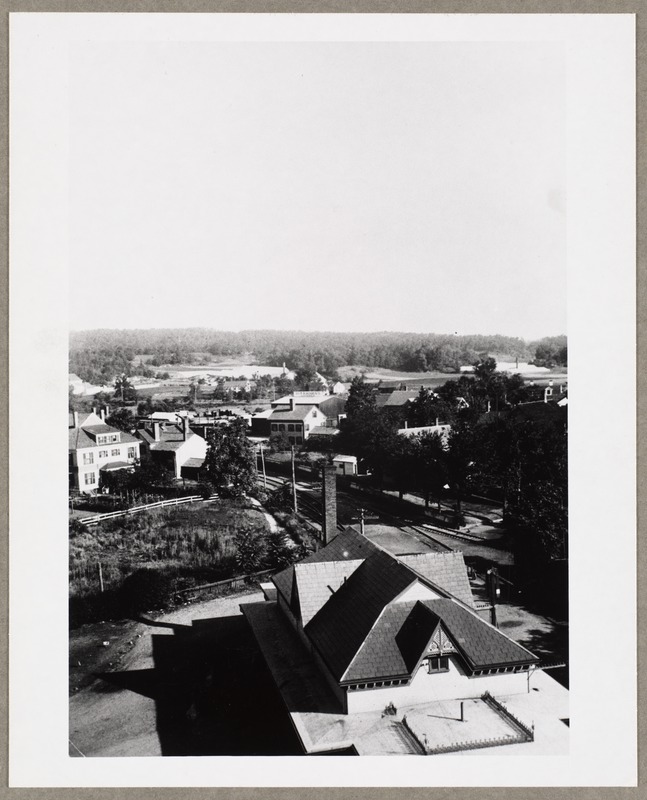 Aerial, to the north, looking over Old Railroad Station from roof of Old Town Hall
