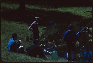 Four boys fishing in pond, Arnold Arboretum, Boston