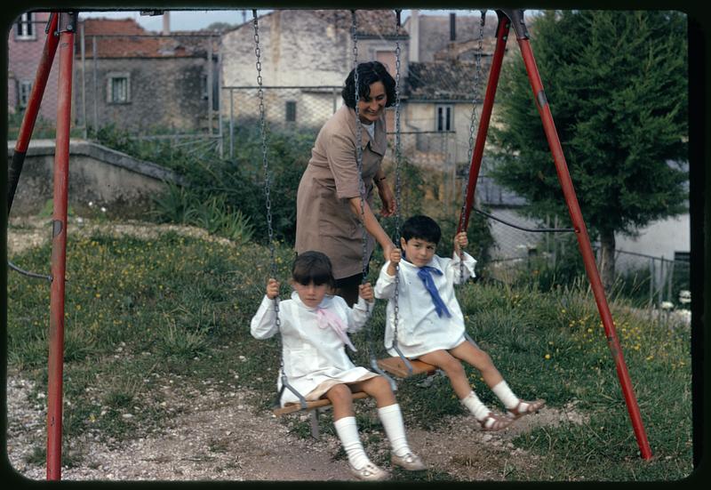 Children on swings, Roccasicura, Italy