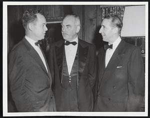 Dean Acheson was welcomed to the campus of Tufts University last night by Tufts President Nils Y. Wessel, left, and Dean Robert B. Stewart, right, of the Fletcher School. The one-time Secretary of State gave the first of three lectures honoring the first undersecretary of state for economic affairs, William L. Clayton. He gives second lecture tonight.