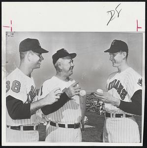 New Managers, New Pitchers of the Cleveland Indians hold mound conference at their Tucson, Ariz., spring training site. Manager George (Birdie) Tebbetts chats with Gordon Seyfried (left) and Ron Nischwitz. The hurlers were obtained from Detroit in the off-season. Tebbetts takes over as pilot from Mel McGaha.