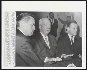 New York – Discuss Delay in Braves Moving Plans – Warren Giles, center, president of the National League, is seated between John J. McHale, left, president of the Milwaukee Braves, and William C. BArtholomay, Braves board chairman, at the meeting of the National League in New York yesterday. The meeting had been called to consider the request of the Braves to transfer their franchise to Atlanta next season, but a temporary restraining order was awarded to the Milwaukee County for the time.