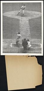 This Was the Reds' Second Hit It was two out in the ninth and Monte Pearson had limited the Reds to one miserable hit when he faces Werber, Cincinnati's third baseman. Pearson shot one down the middle, Werber swung and the ball went into left field for the National League champs' second hit. Here's the scene, Pearson pitching, Herber connecting and the ball shown directly in front of him. But it did no good, for the Yankees shut out the Reds 4-0 in this, the second game of the World Series in New York.