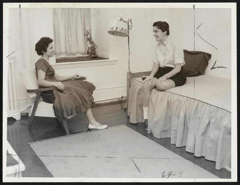 Newly Furnished room at the Franklin Square House. The delighted occupants are Lucila M. Molina of Panama, left, and Constance Forand of New Bedford.