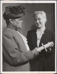 Radio's Ma Perkins (right) receives a National Family Week citation from Mrs. Clarissa Clement, American Mother of the Year, at the CBS Studios in New York this week