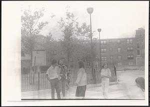 Group of young people with cameras in Newtowne Court