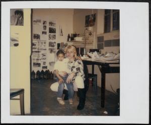 Susan Richards posing with a girl in art room