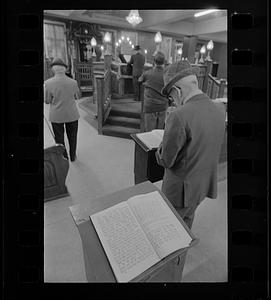 Jewish men conduct synagogue service, Mattapan