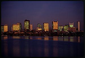 Sunset reflected in downtown office buildings & Charles River Basin, Boston