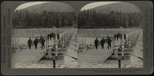 Inspecting a pontoon bridge in the French section nearing completion
