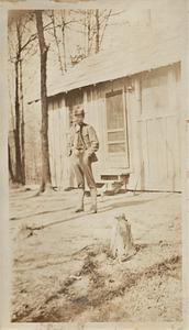 Albert T. Chase in uniform outside cabin