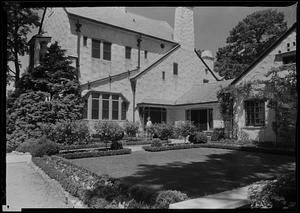 Dr. A.C. Wilson's house, diagonal view N.E. across terrace. Mrs. W. Figure
