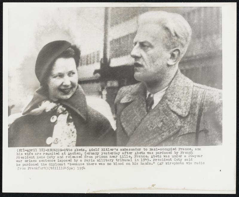 Reunion - Otto Abetz, Adolf Hitler's ambassador to Nazi-occupied France, and his wife are reunited at Aachen, Germany yesterday after Abetz was pardoned by French President Rene Coty and released from prison near Lille, France. Abetz was under 20-year war crimes sentence imposed by a Paris military tribunal in 1949. President Coty said he pardoned the diplomat "because there was no blood on his hands."