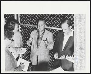 Describes Breakout Attempt--Associate Warden W.D. Achuff, center, tells newsmen of the hacksaw blade used by death row inmates to saw bars and escape from their cells during the night at San Quentin Prison. The six condemned killers who attempted the break held two guards, C.L. Deatrick and Sgt. R.R. Kardell as hostages. The two guards are in serious condition from head wounds, the convicts inflicted with pipes. The convicts have been returned to their cells. At right is Associate Warden Dale B. Frady.