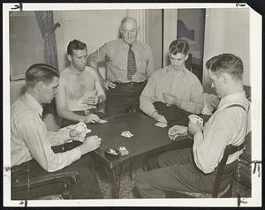Ace High. Their game Sept. 13 with the New York Giants postponed because of wet grounds, these members of the National League leading Pittsburgh Pirates whiled away the time by playing "hearts" in their Manhattan hotel headquarters. Their series with the Giants may be a vital factor in deciding the close four-way race for the pennant. Shown (L. to R.) are Mace Brown, coach; Bob Klinger, pitcher; and Arky Vaughan, shortstop.