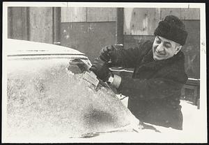 Ice sweeping. Rev Dr. Harry P. Hatzopoulos of St. John the Baptist Greek Orthodox Church Boston, Mass.