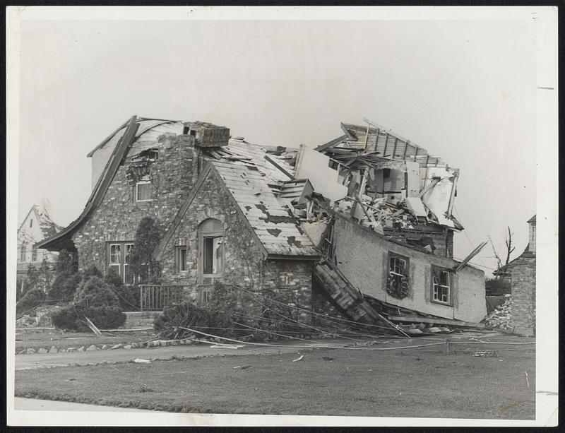 Maple Avenue, Shrewsbury - This home was typical of the damage in this residential district as the tornado hit the Worcester area yesterday.