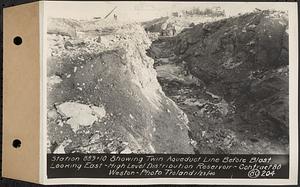 Contract No. 80, High Level Distribution Reservoir, Weston, Sta. 889+10 showing twin aqueduct line before blast looking east, high level distribution reservoir, Weston, Mass., Jan. 23, 1940