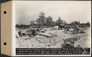 Contract No. 80, High Level Distribution Reservoir, Weston, looking east showing uncompleted pole line and parking area at gatehouse, high level distribution reservoir, Weston, Mass., Aug. 12, 1940