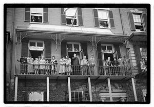 People standing on a balcony