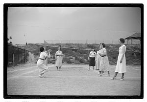 Women playing volleyball