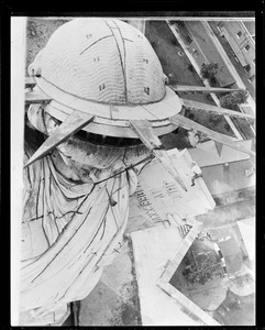 New York steeplejack doing his stuff on top of the Statue of Liberty