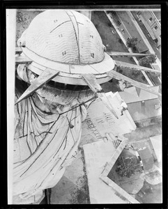NYC steeplejack on top of Statue of Liberty