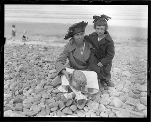 Woman and child at the beach