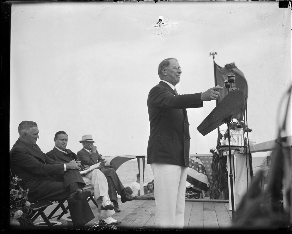 Man speaking from platform