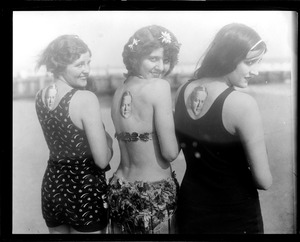 Hoover admirers - bathing beauties. Atlantic Beach, Long Island, N.Y. Left to right, Miss Dorothy Britton (Miss Universe of 1927), Miss Ageada, and Miss Valedad Duncan, who are beooved or behoovered to help out Hoover however they are able. There were pictures of the Republican nominee on their pretty backs.