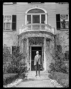 Principal of Andover Academy Alfred E. Stearns stands in front of his campus residence. Graduated from Amherst in 1894, a year before President Coolidge.