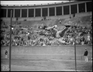 Champion high jumper Spitz at Harvard Stadium for I.C.A. track meet
