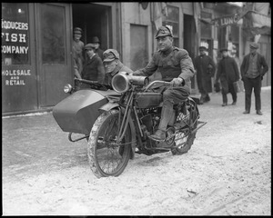 Waterfront guarded from German spies. National Guardsman on motorcycle patrol