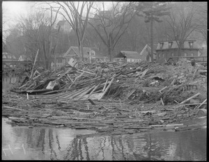 Flood wreckage on the Worcester Branch River looking toward Elm Street, Montpelier, Vermont