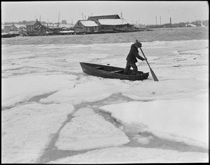 Boat and man in ice water