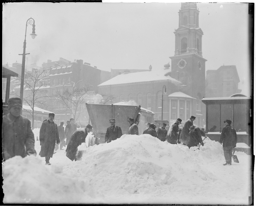 Severe snowstorm reaches Boston, clearing snow at corner of Park and Tremont St.