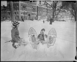 Girl tries snow shoes on snowy Common