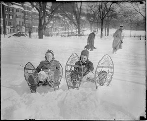 Girls try snow shoes on Boston Common