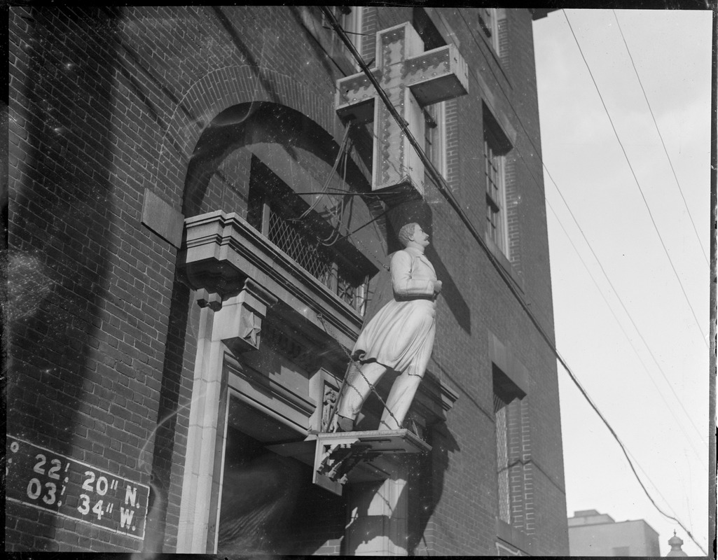 Figure head on church