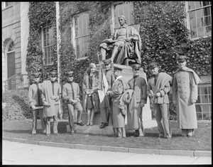 West Point cadets posed with John Harvard's statue