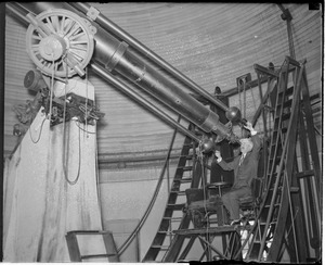 Man working at telescope in Cambridge observatory